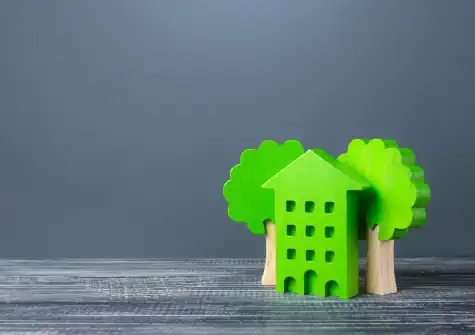 Toy house with green trees