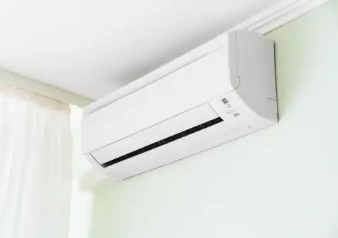 Split system air conditioner installed on wall